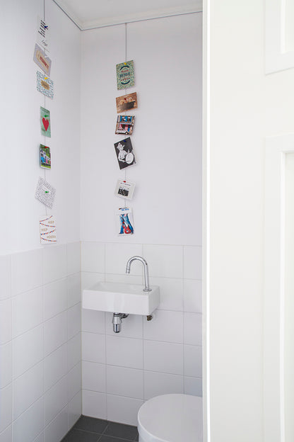 Kraftige neodymium magneter i STAS magnet set holder bildene dine trygt på plass.